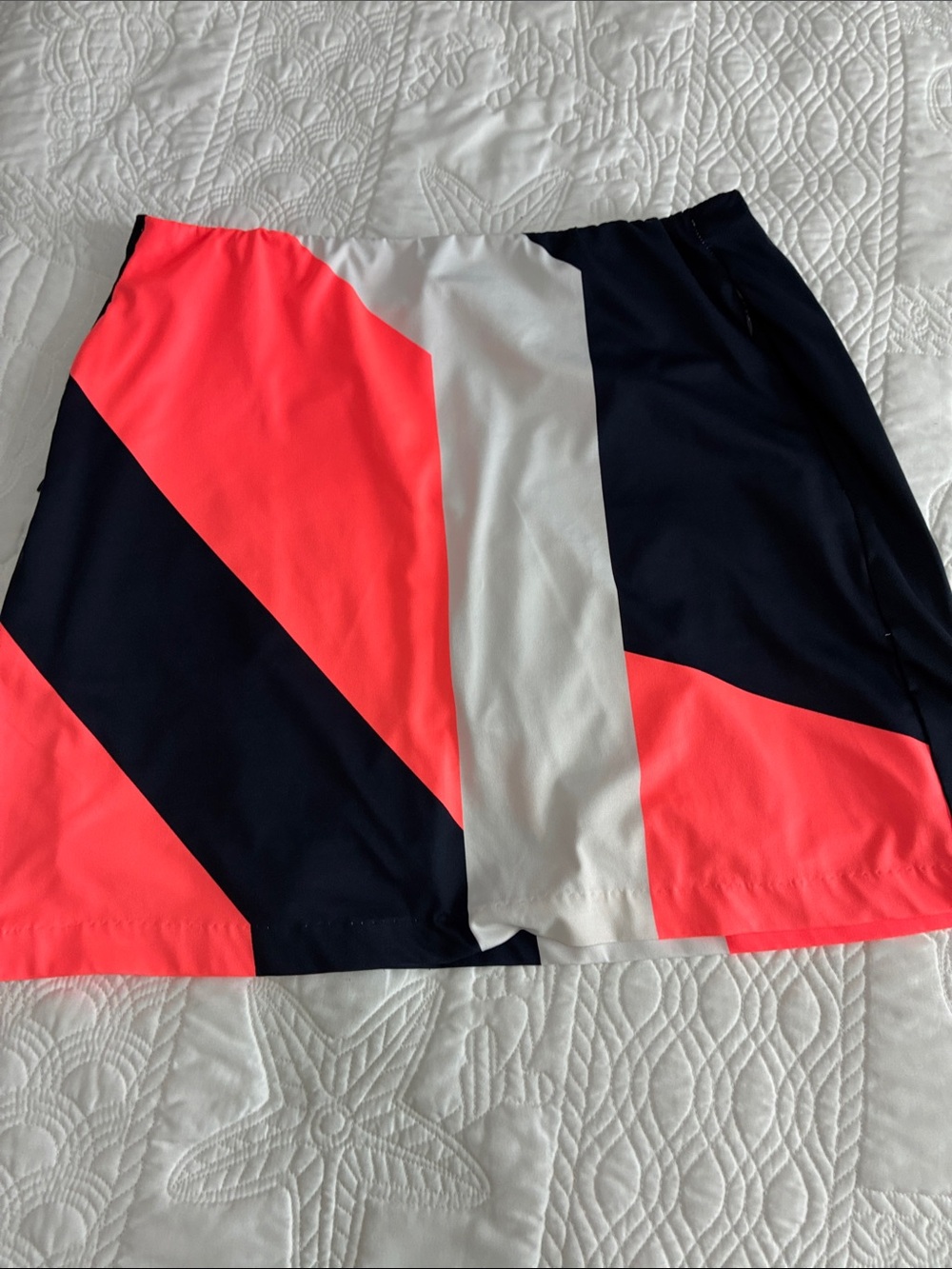 Tail Colorblock Skort in Neon Coral, Navy & White
